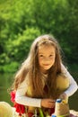 Cute toddler girl playing with sand toy on a beach. Royalty Free Stock Photo