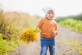 Adorable toddler girl portrait on beautiful autumn day.