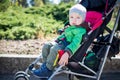 Cute Toddler in pram on a walk Royalty Free Stock Photo