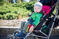 Cute Toddler in pram on a walk