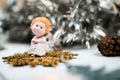 Cute christmas angel and fir con. Beautiful new years composition. Royalty Free Stock Photo