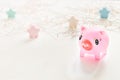 Cute toy Pink Piggy over bokeh lights and star background. Year of pig 2019. Pig symbol of year, Chinese Horoscope