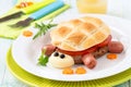 Cute turtle shape hamburger with a meat burger, cheese and sausages for kids