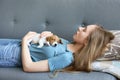 Young woman with her jack russell terrier puppy