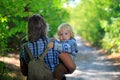 Cute two-year-old boy on mother's hands Royalty Free Stock Photo