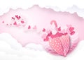 Cute umbrella with hearts shape on clouds background