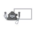 Cute underwater camera cartoon character Thumbs up bring a white board