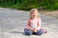 Cute upset unhappy toddler girl crying. Angry emotional child shouting. Portrait of kid with tears. Girl sitting on