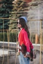 Urban girl with skateboard Royalty Free Stock Photo