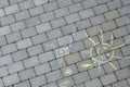 Cute view of chalk drawings on paving slabs.