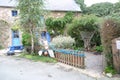 A cute village house in France, the blue door and the blue rope detail are very beautiful