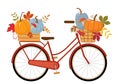 Cute vintage red bicycle, wood crate and basket with pumpkins, autumn leaves, and mushrooms Royalty Free Stock Photo