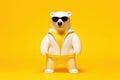 Cute white bear in swimming suit ready to swim on yell, concept of Playful