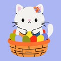 Cute White Cat in Easter Basket with Colorful Eggs Royalty Free Stock Photo