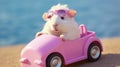 A cute white hamster wearing pink sunglasses driving a pink toy car