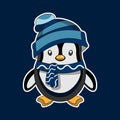 Cute winter penguin wearing blue hat and scarft