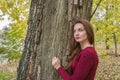 Cute woman in autumn portrait.