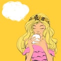 Cute woman with freckles and flowers diadem on beautiful hair drinking tea. Vector illustration with bubble for text.
