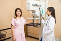 Cute woman getting a mammography Royalty Free Stock Photo