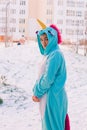 Cute woman in kigurumi unicorn costume Royalty Free Stock Photo