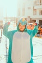 Cute woman in kigurumi unicorn costume Royalty Free Stock Photo