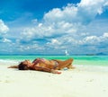 Cute woman relaxing on the summer tropical beach. White sand, b Royalty Free Stock Photo