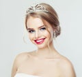 Cute woman smiling. Pretty model with wedding hair and diamonds jewelry portrait Royalty Free Stock Photo