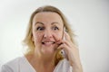 cute woman surprised by bad news talking on phone raised bad news understand that someone is taking advantage of each