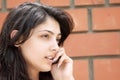 Cute woman talking cellphone closeup Royalty Free Stock Photo