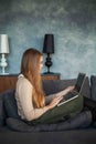 Cute Woman Working at Home Office and Using Laptop Royalty Free Stock Photo