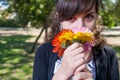 Cute women smelling bunch of flowers Royalty Free Stock Photo