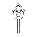 Cute wooden birdhouse. Wooden building for the care Royalty Free Stock Photo