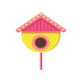 Cute wooden birdhouse on stand. Yellow nesting box with pink roof. Small house for birds. Flat vector element for Royalty Free Stock Photo