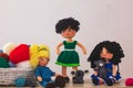 Cute wool dolls are lying on the table Royalty Free Stock Photo