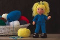 Cute wool dolls are lying on the table Royalty Free Stock Photo