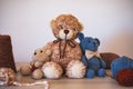 Cute wool teddy bears are lying on the table Royalty Free Stock Photo