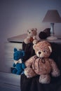 Cute wool teddy bears are lying on the table Royalty Free Stock Photo