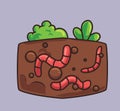 cute worms underground fertilizer plant. cartoon animal nature concept Isolated illustration. Flat Style suitable for Sticker Icon Royalty Free Stock Photo