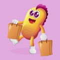 Cute yellow monster happy shopping Royalty Free Stock Photo