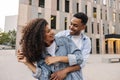 Cute young african couple in love are relaxing outdoors enjoying each other. Royalty Free Stock Photo