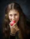 Cute young armenian girl with apple Royalty Free Stock Photo