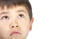 Cute young asian boy look up with a sad face Royalty Free Stock Photo