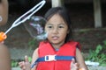 Young Girl watching Bubble