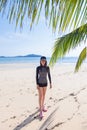 Cute young asian woman in bikini enjoying on beautiful beach in Ko Phayam Royalty Free Stock Photo