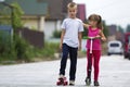 Cute young blond children, brother and sister, girl in pink clot Royalty Free Stock Photo