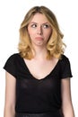 Cute young blond girl, mock sadness - humorous concept, isolated Royalty Free Stock Photo