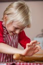 Cute young boy baking Royalty Free Stock Photo