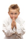 Cute young boy bowing Royalty Free Stock Photo