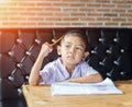 Cute young boy doing homework Royalty Free Stock Photo