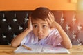 Cute young boy doing homework Royalty Free Stock Photo